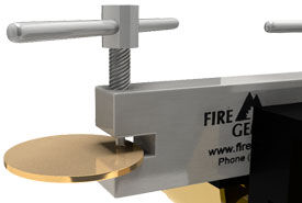 Metal blank positioned in hole punch tool